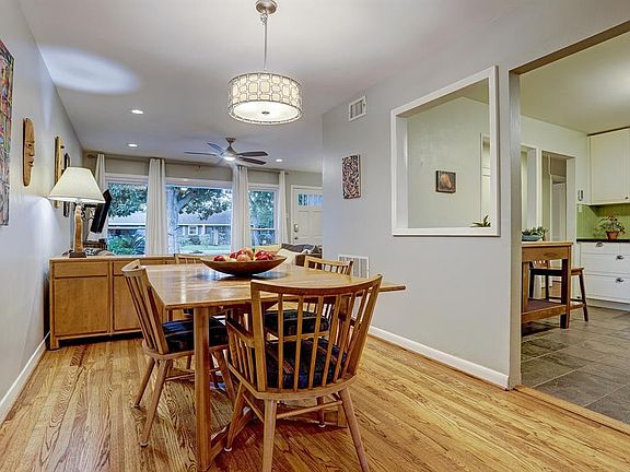 "Formal" Dining off the kitchen with pass through for entertaining and an open feel. Easy flow throughout this home and a fabulous layout for post COVID gatherings!