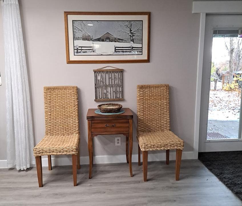 Open area between kitchen and living room. Newly installed Luxury laminate floors.