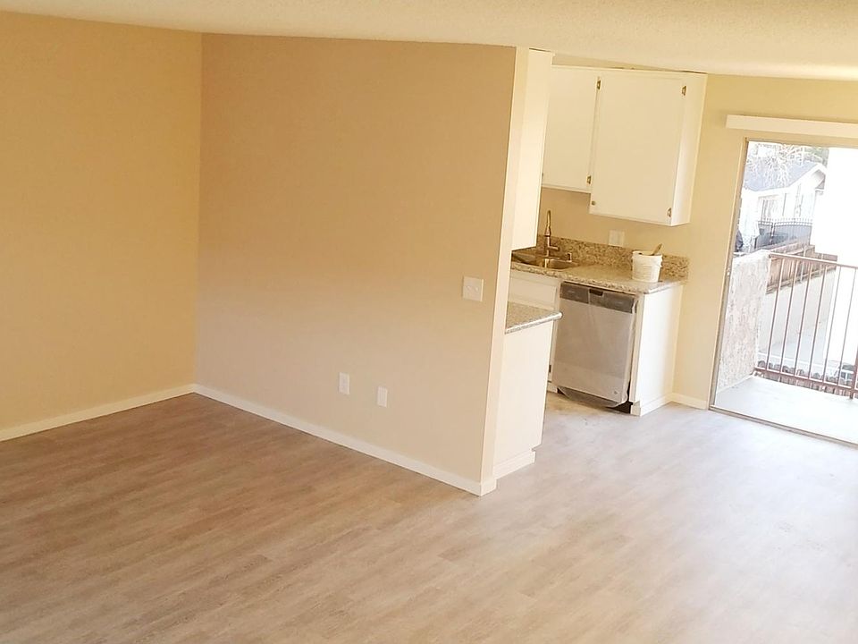 Living room, dining room & mountain view balcony!