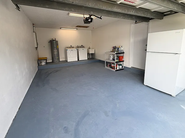Garage one car 24' x 15' (excluding refrigerator)
