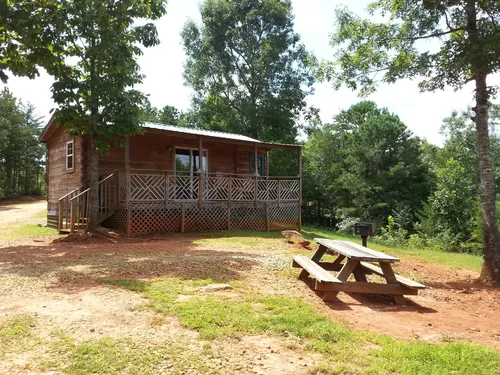 Front of unit. "Tiny Home" QQB pit, pic-nic table, fire ring - 566 Flatlander Dr #2