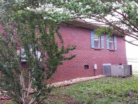 right side of house with new A/C unit