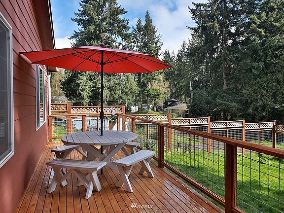 Newer front deck provides a delightful space for you to enjoy the peace and quiet that lives here.