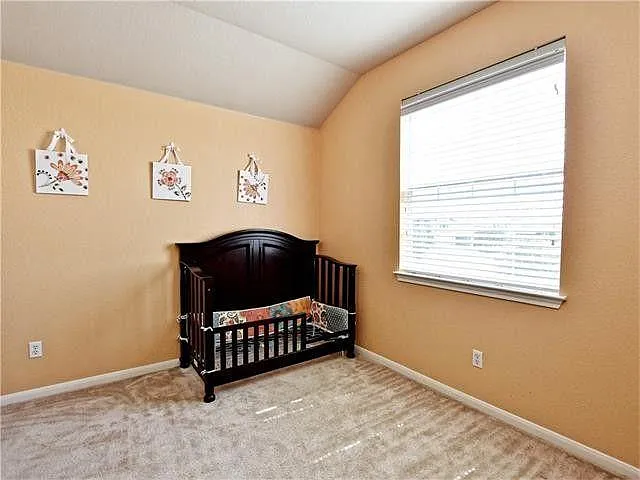 Fourth bedroom. Remote-controlled ceiling fan added in 2022.