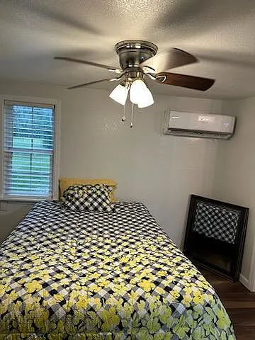nice bedroom, with Mini split HVAC, Window, closet, ceiling fan