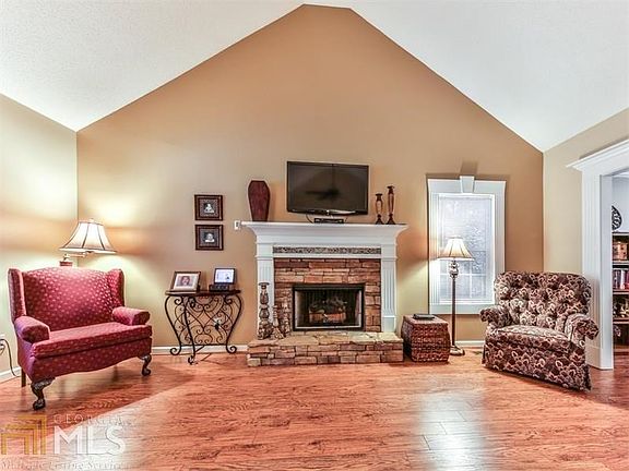 Great room boast cozy fireplace with gas logs