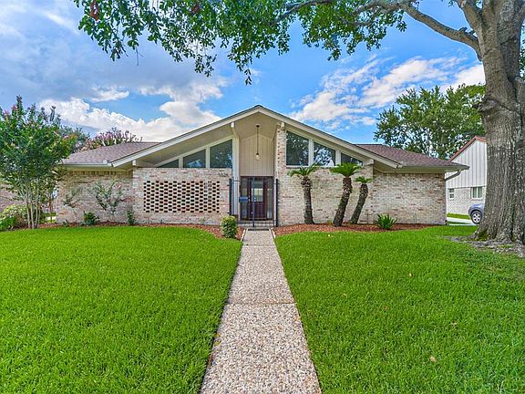 This beautiful single story home has been totally updated and recently repainted throughout.