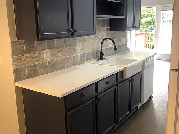Updated backsplash and newly installed quartz countertops