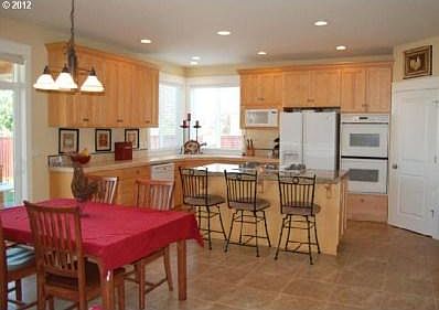 4th image of 2407 NW 121st Cir