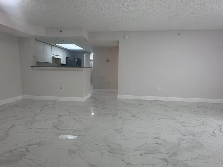 5011 Wiles Rd #207 — Photo 12