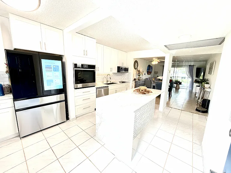 650 SW 124th Ter #202 — Photo 12