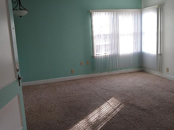 Large living room with lots of natural light.