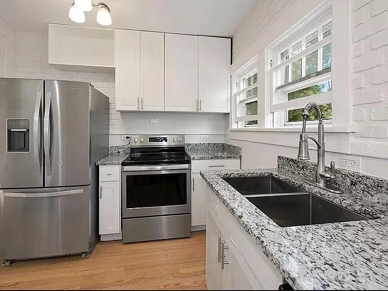 1521 E Platte Ave — Photo 4