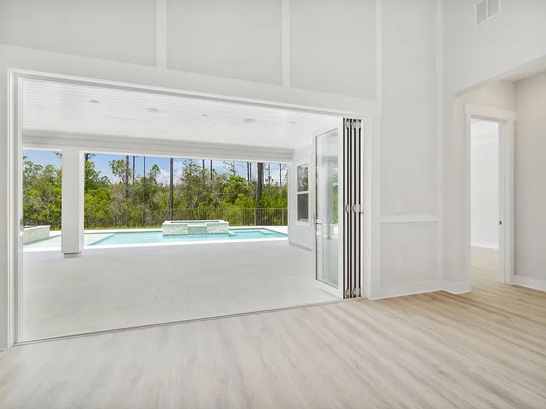 Heated pool with elevated hot tub. Custom lighting