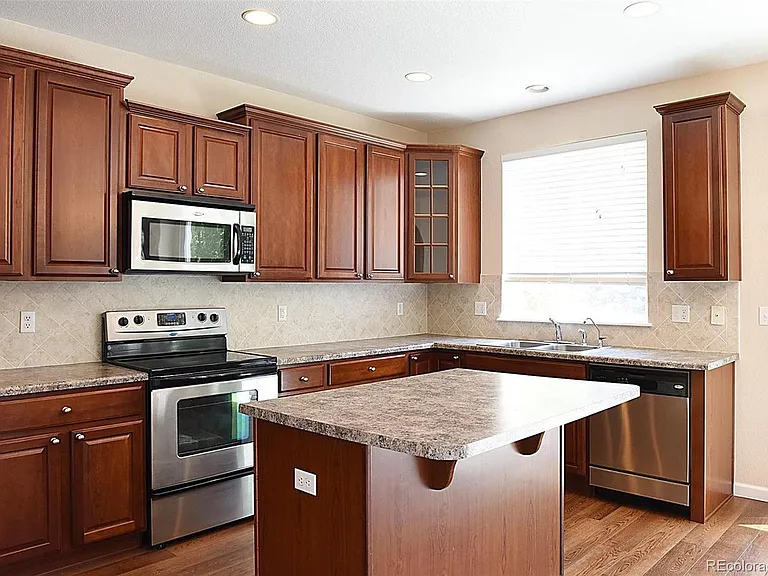 7730 S Joplin Way — Photo 18