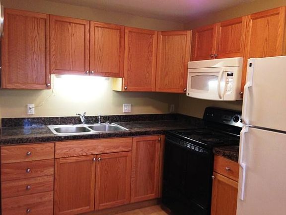Granite countertops, maple cabinets, plenty of storage.