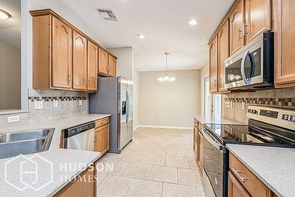 4th image of 2851 Woodstone Dr