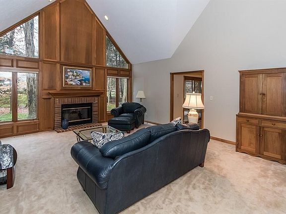 Great room is large and opens to the kitchen area and back of home