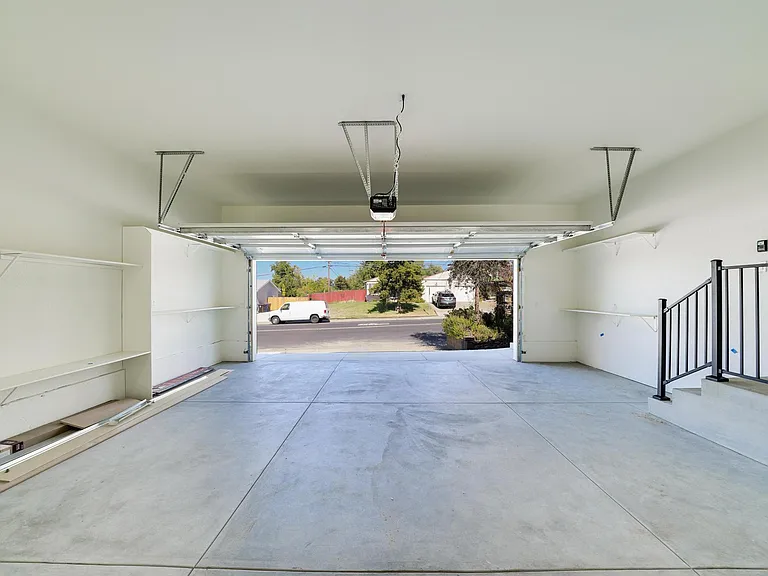 Brand new 2 car garage. New paint, ample shelves/storage, wifi garage door opener (manual openers also available). Garage steps include safety railing.
