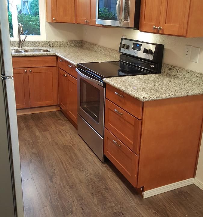 New Cabinets, stainless steel appliances, Pergo floors