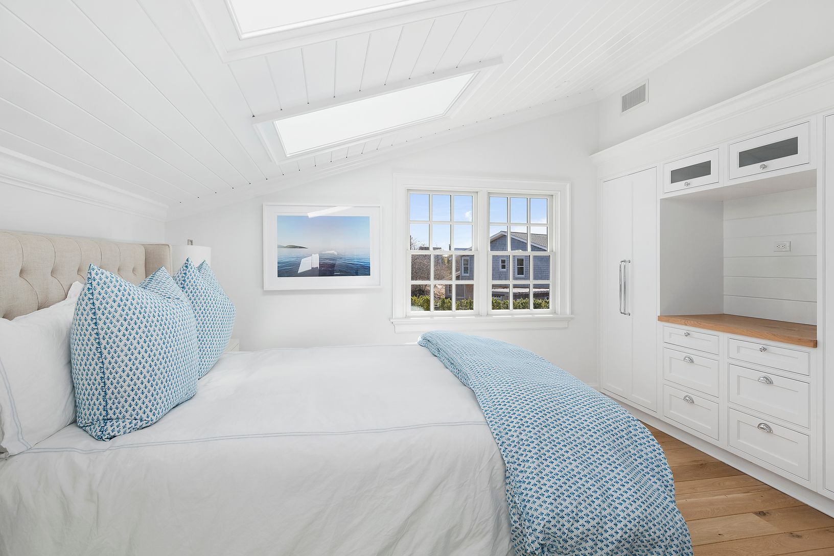 Ensuite guest bedroom with custom built ins