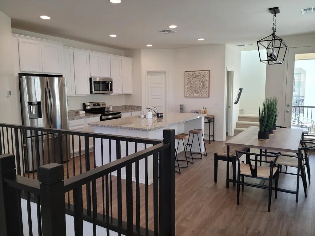 2nd floor kitchen and dining area. Access to outdoor balcony. - 1744 E Chelsea Ln