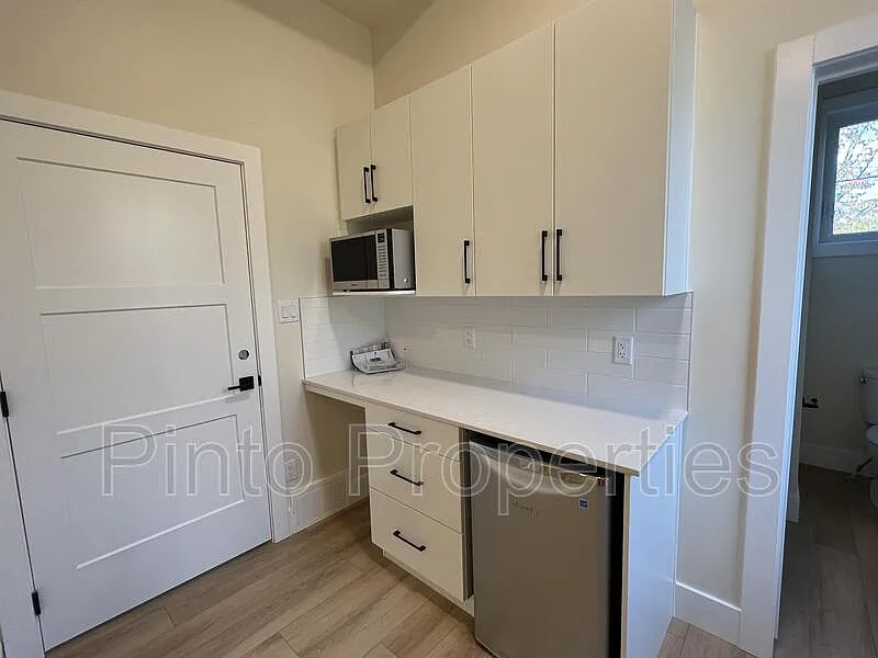 Building Photo - 8719 110th St NW #3B