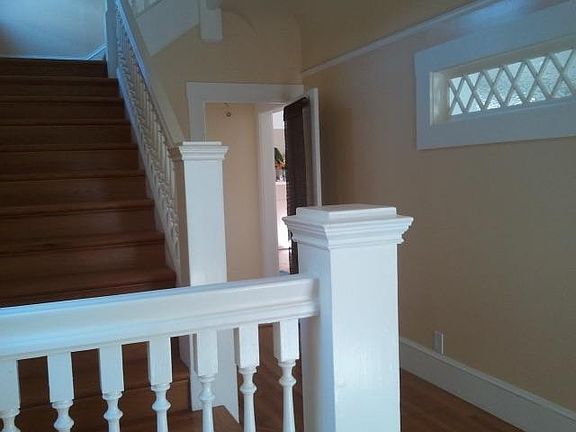 Front entry w stairs to upper unit, door to lower one