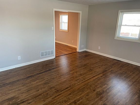 View of living room and entry into kitchen