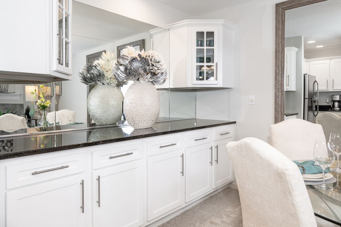 Large buffet with ample counter space and cabinets0