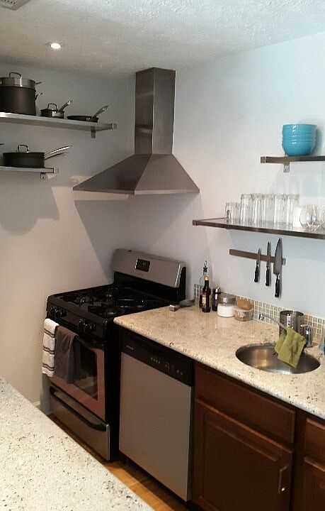 Kitchen with exhaust hood