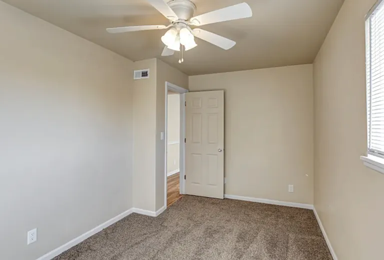 Ceiling Fan & Plush Carpet in Bedroom #1 Ceiling Fan & Plush Carpet in Bedroom #1
