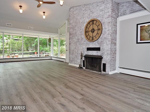Sunny Living Room with Fireplace