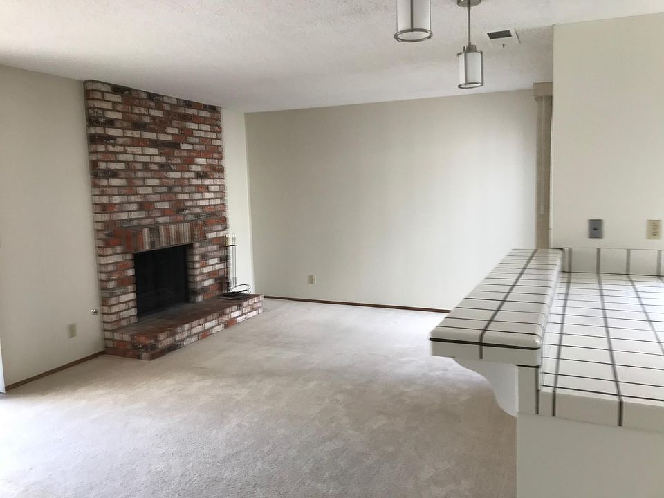 Kitchen bar and family room with fireplace