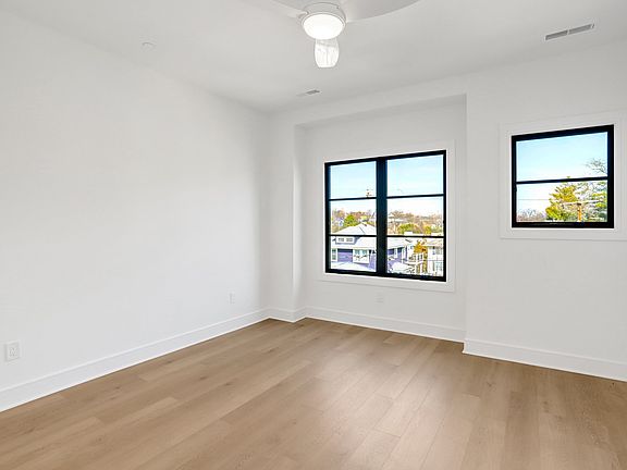 Bedroom 3 with 2 closets and private bath with double vanity, shower and private WC