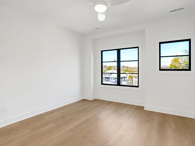 Bedroom 3 with 2 closets and private bath with double vanity, shower and private WC