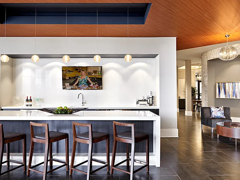 Entertaining kitchen and game lounge with outdoor patio