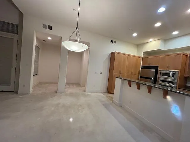 Main Floor - Great Room with Kitchen, Den, Hall Bath, 2 Balconies, etc