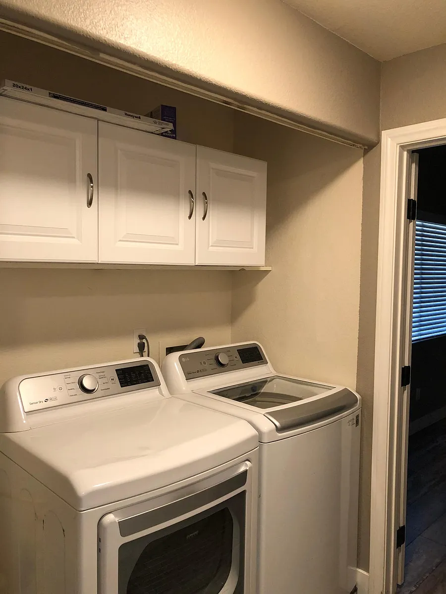 Laundry "room". Washer and dryer stay in the rental. - 1502 Dallas Ter