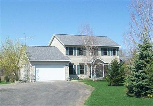 Front view with integral 2 car garage