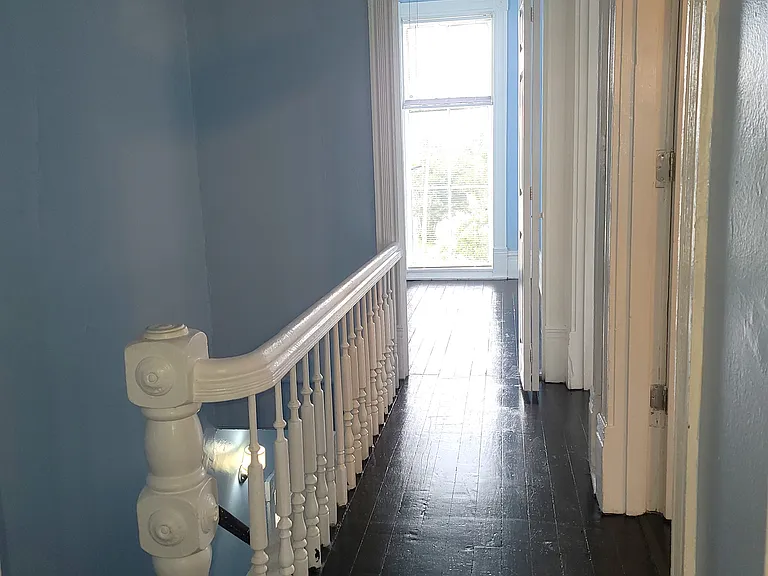 Hallway connects to all 3 rooms & bathroom.