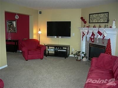A cozy gas fireplace is just waiting for you! Newer carpet was recently installed on the first floor