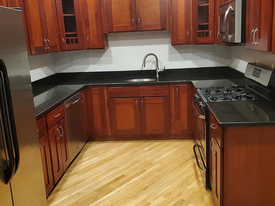 View of Full Kitchen, including Dishwasher and Microwave