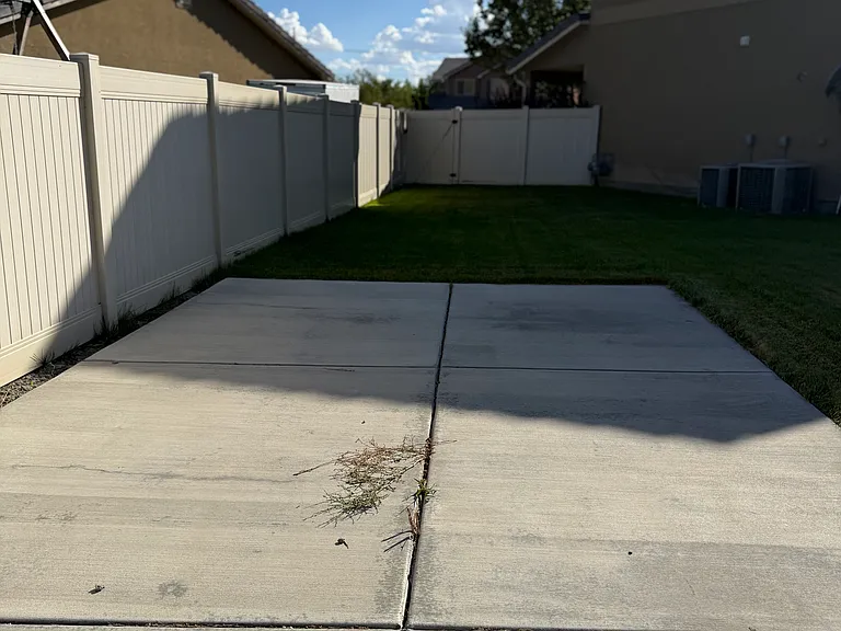 East Side Backyard to the East Side Lawn Towards the Front