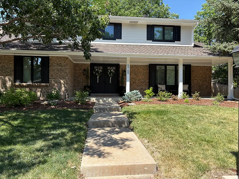 5769 S Geneva St — Photo 1