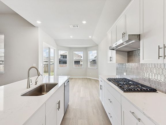 Have great views of the dining and living areas from the kitchen.