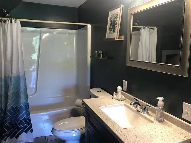 1090 Lakes Region Rd — Photo 12