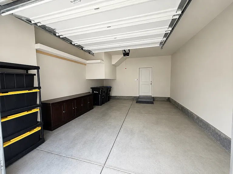 Attached over sized 1-car garage.