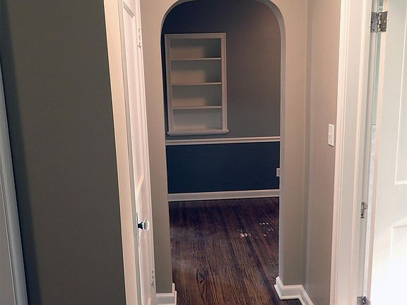 Refurbished hardwood floors and updated paint.