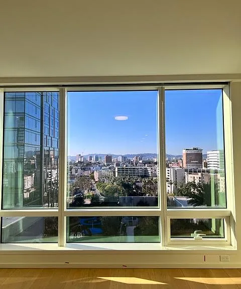 The view looks into the garden amenities on the 9th floor